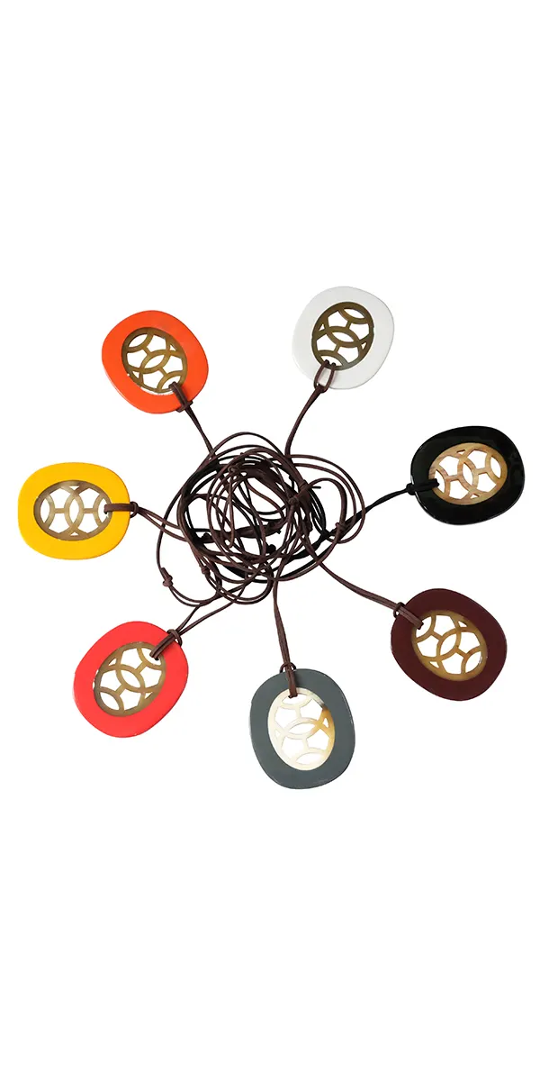 One horn pendant design produced in seven lacquer colors